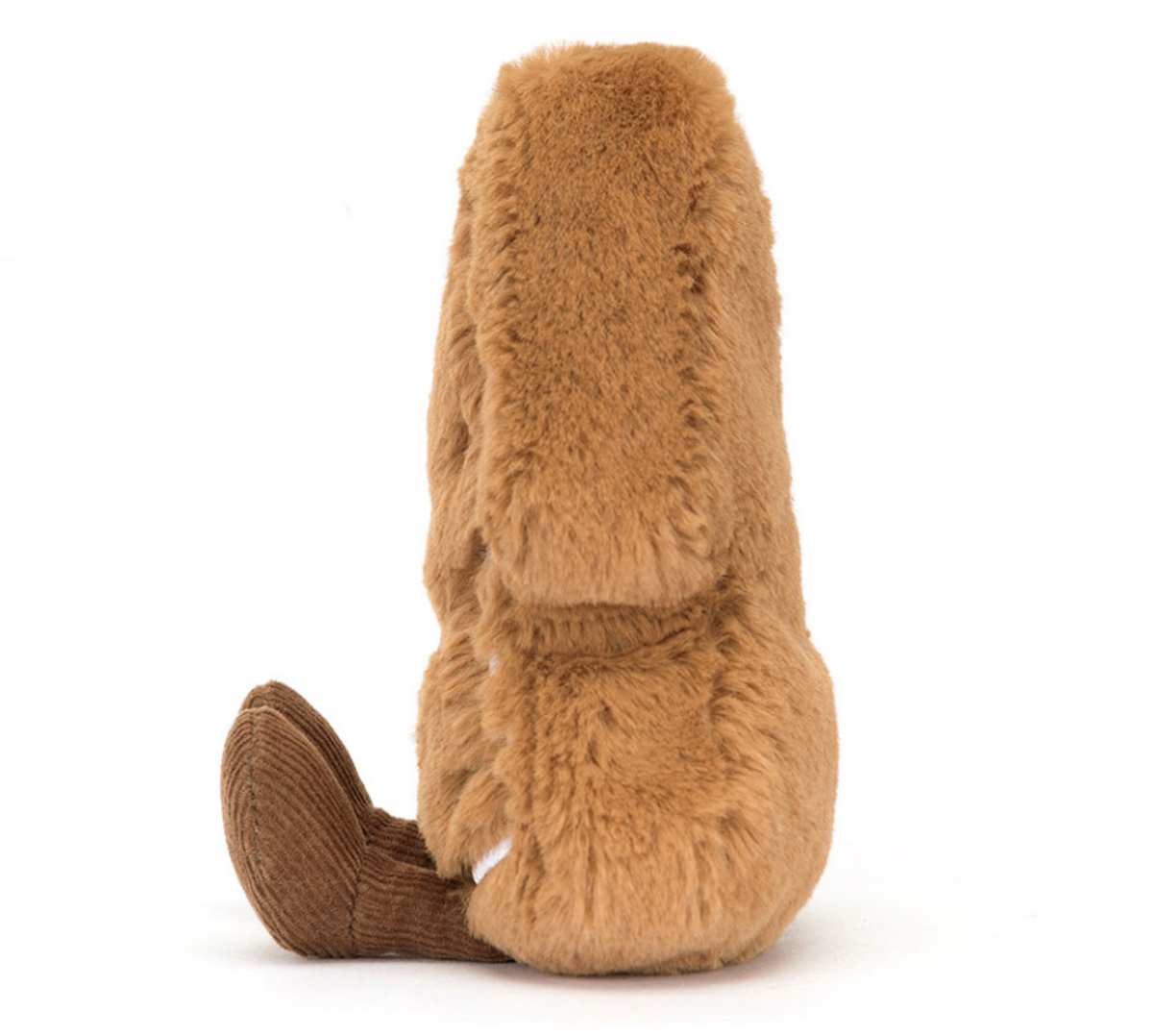 A plush toy resembling a Christmas tree cookie with brown fur, and brown cord boots.