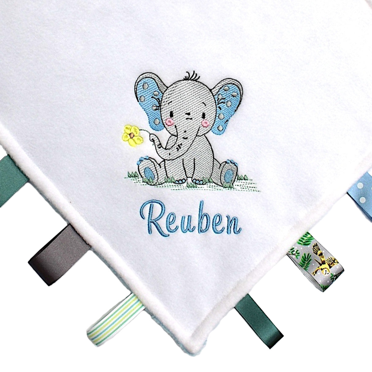 Baby comfort blanket with elephant design and name personalised on a white background