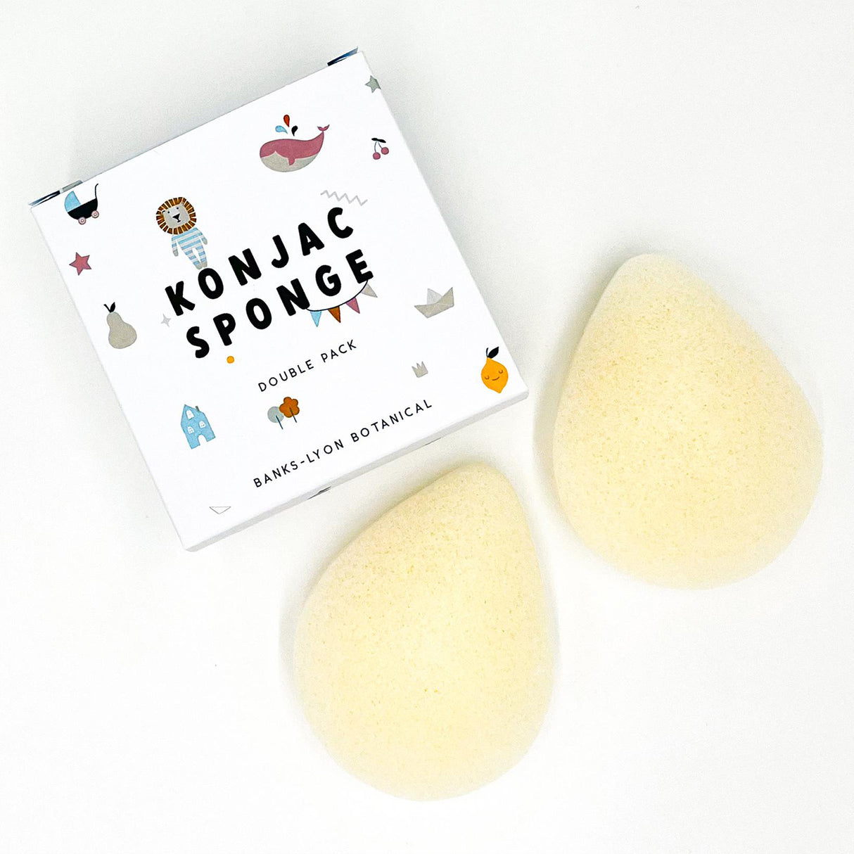 Konjac sponges with packaging on a white background