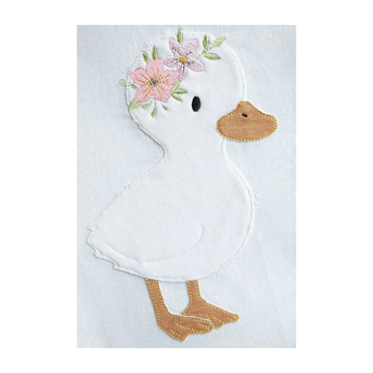 Embroidered design of a goose or duckling with flowers on a white background