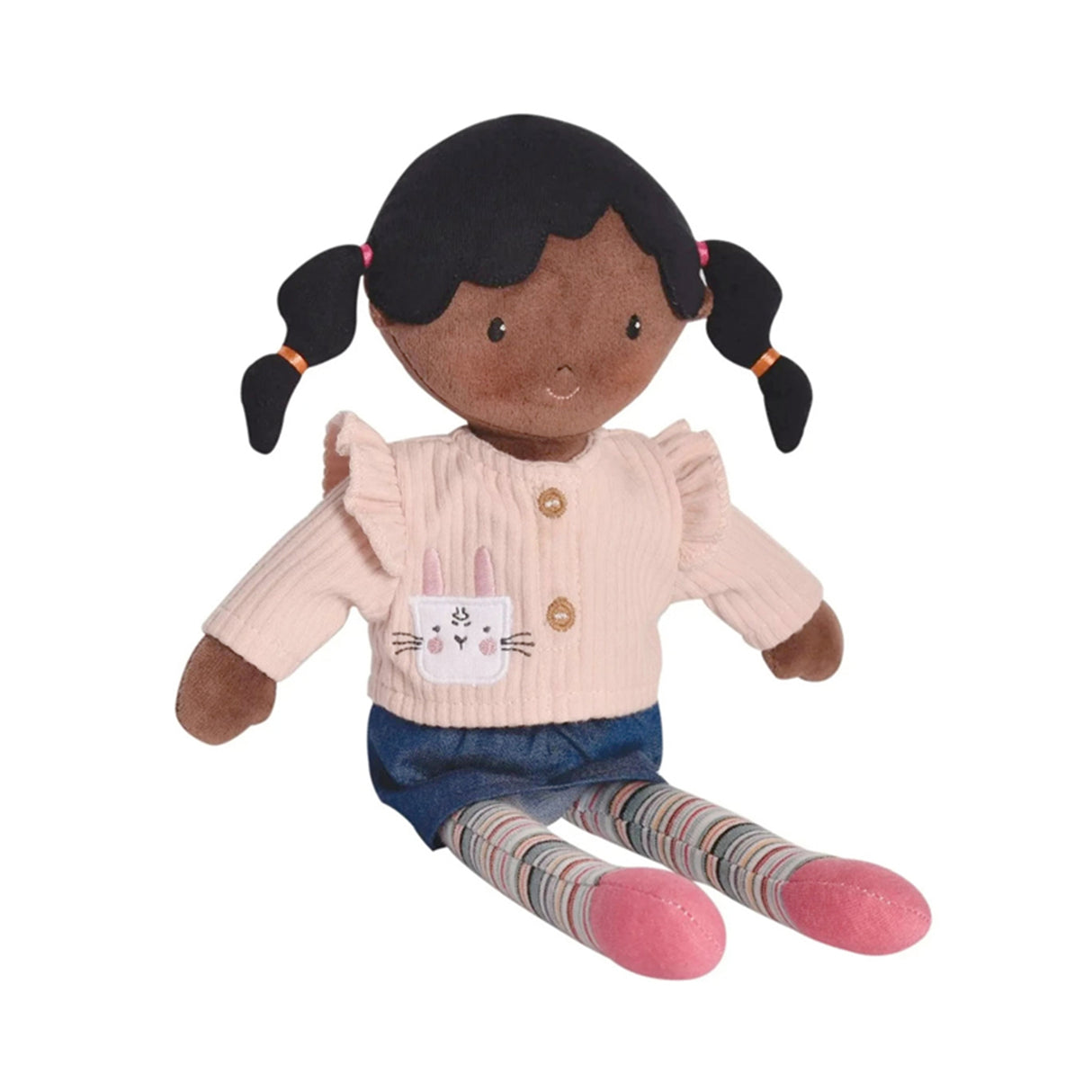 Rag doll with black skin and hair in pigtails, wearing a pink shirt, blue skirt, and striped socks
