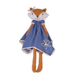 Stuffed fox toy with a blue dress on a white background