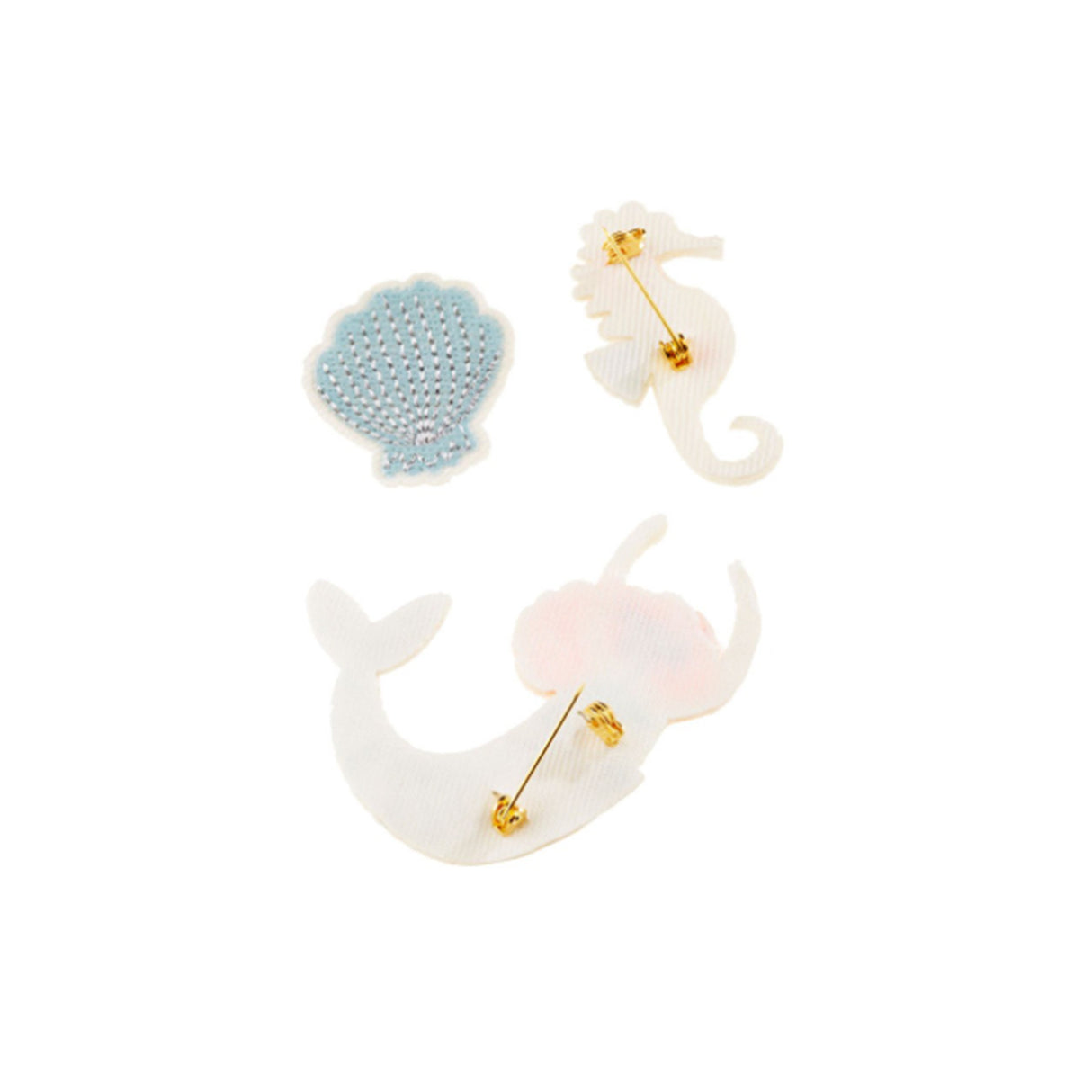 Set of embroidered brooches including a mermaid, seashell, and seahorse
