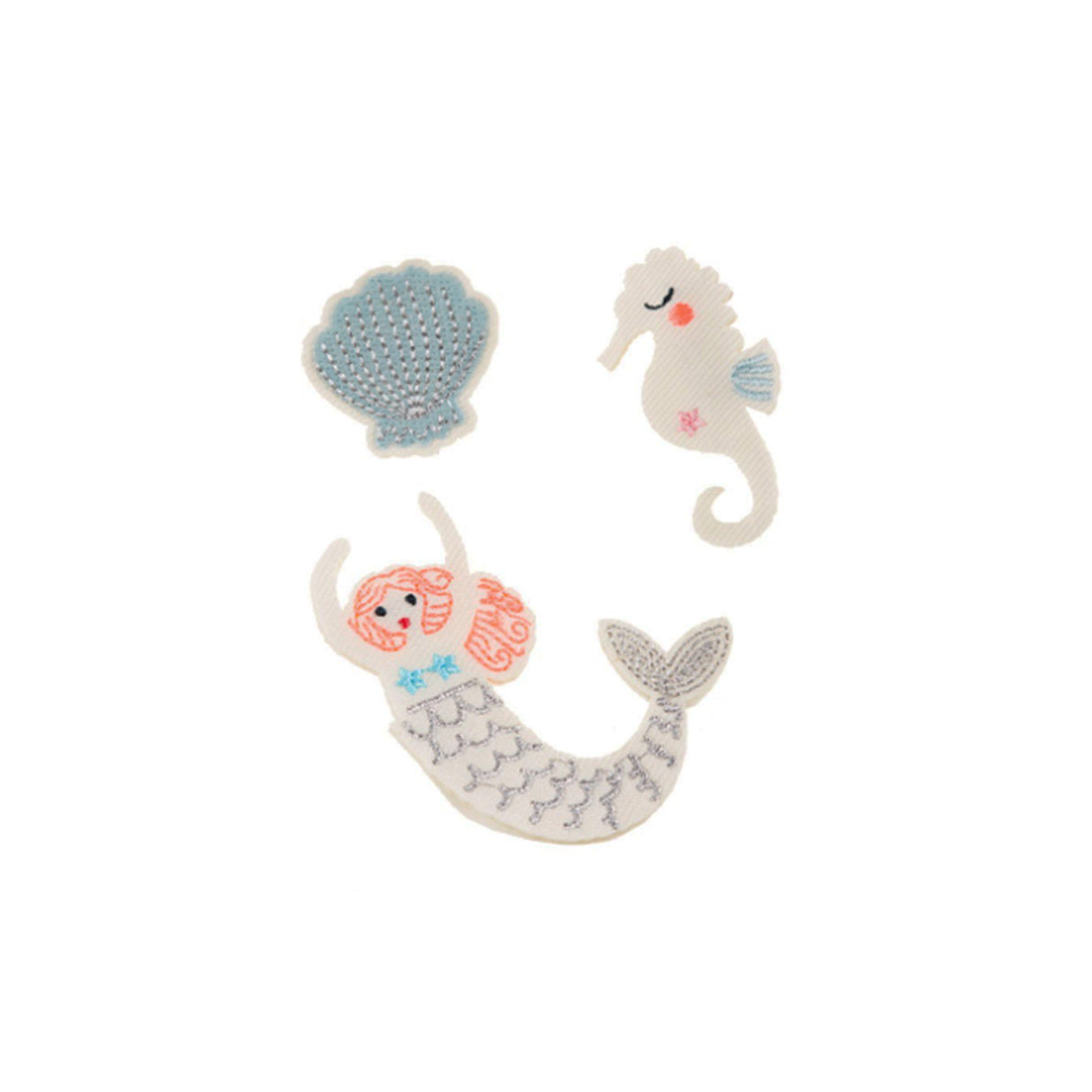 Set of embroidered brooches including a mermaid, seashell, and seahorse