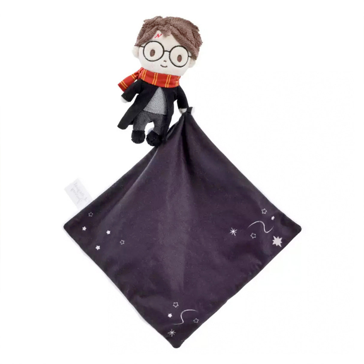 Harry Potter themed comfort blanket with a plush toy of Harry Potter in his signature school robes and Gryffindor scarf attached to the corner.