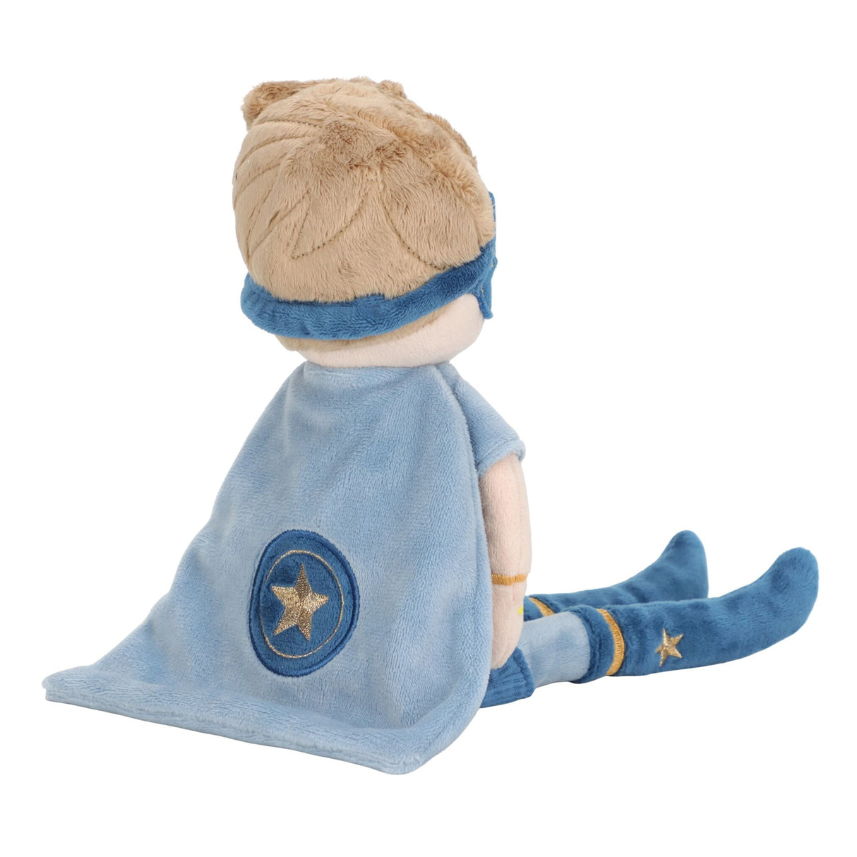Toy figure of a child in a blue cape with a star emblem on a white background