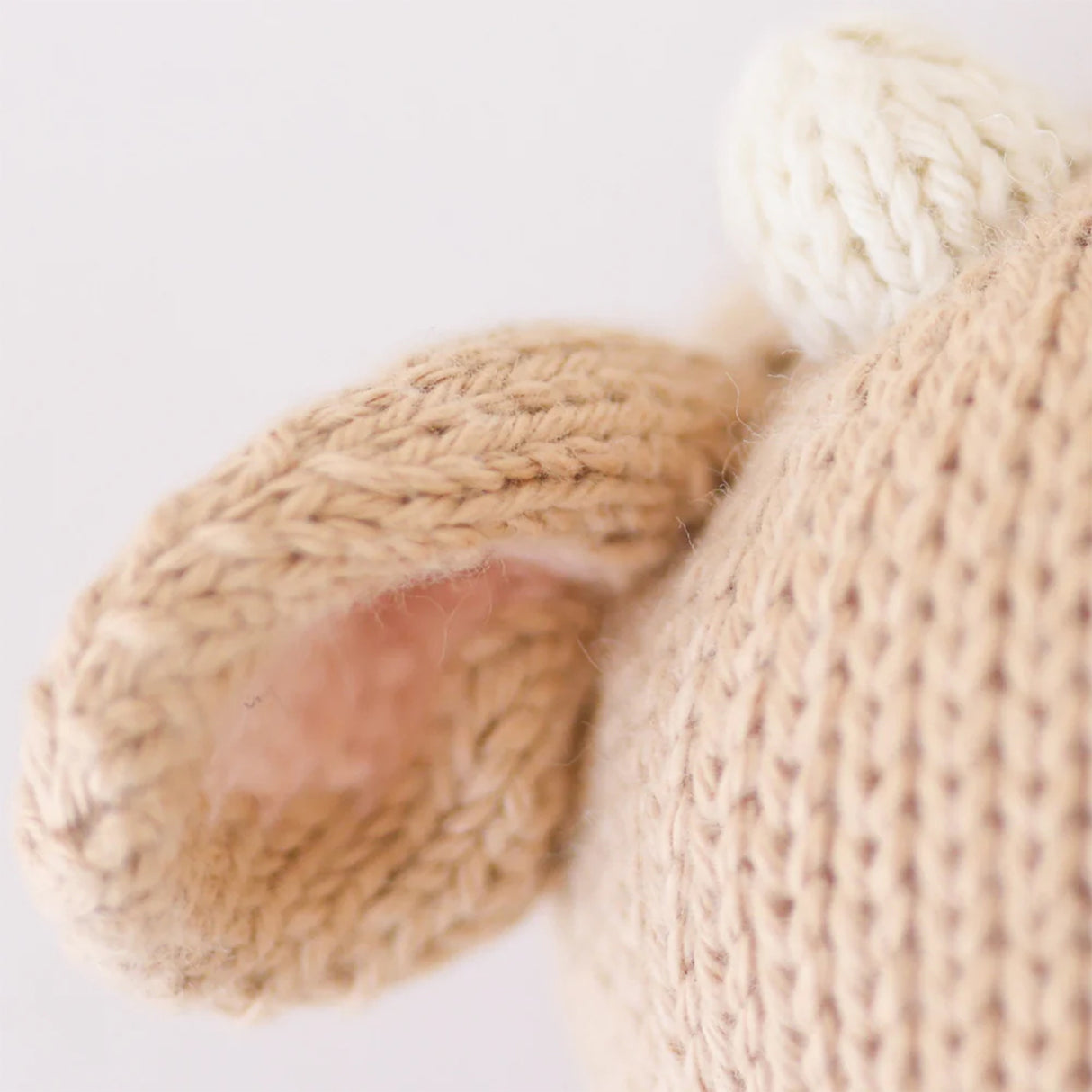 Close-up of a textured beige ball on a light background