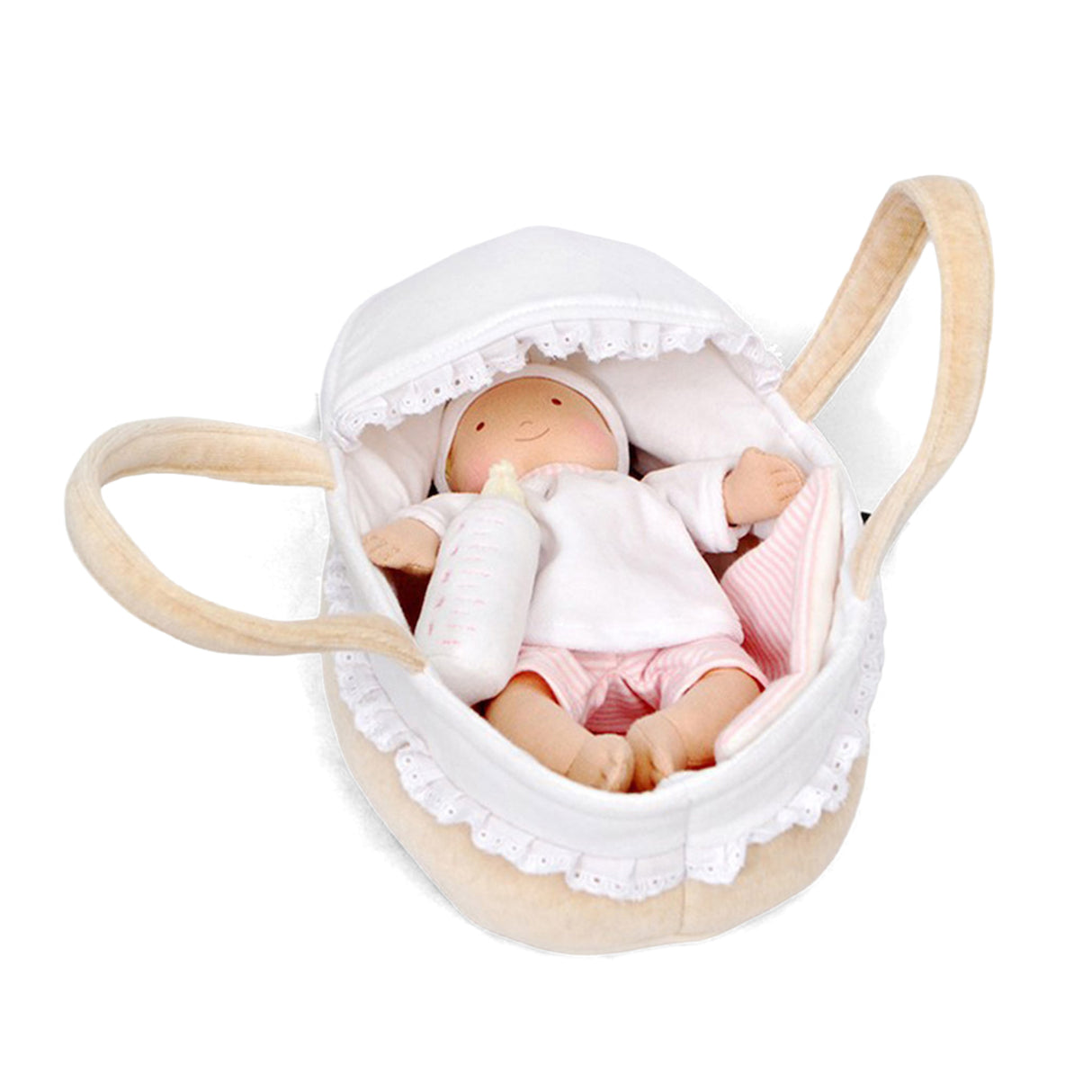Baby doll in a white carry cot crib with a white top and stripey pink shorts on a white background
