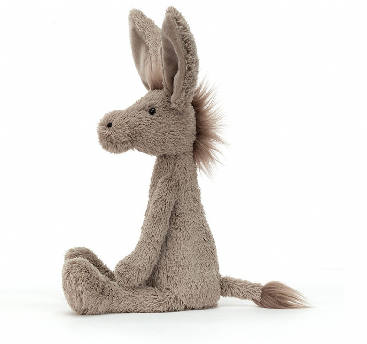 A soft gray fabric donkey toy with a spiky mane and long flappy ears, sitting upright.