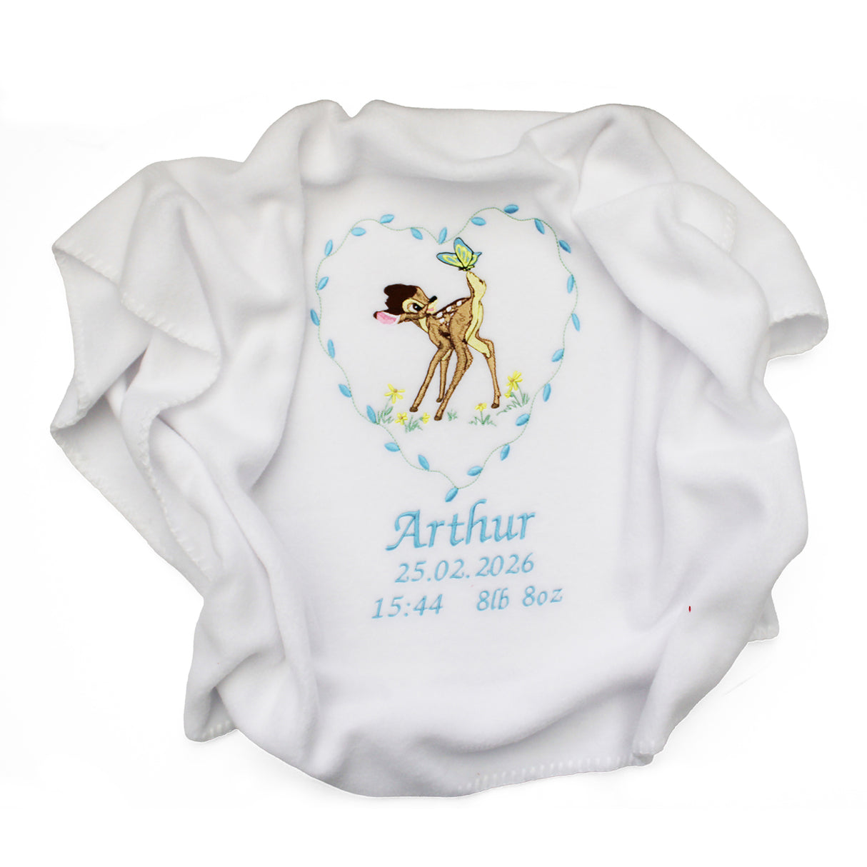 White fleece baby blanket with embroidered bambi and butterfly design in a blue heart and personalised name and date of birth