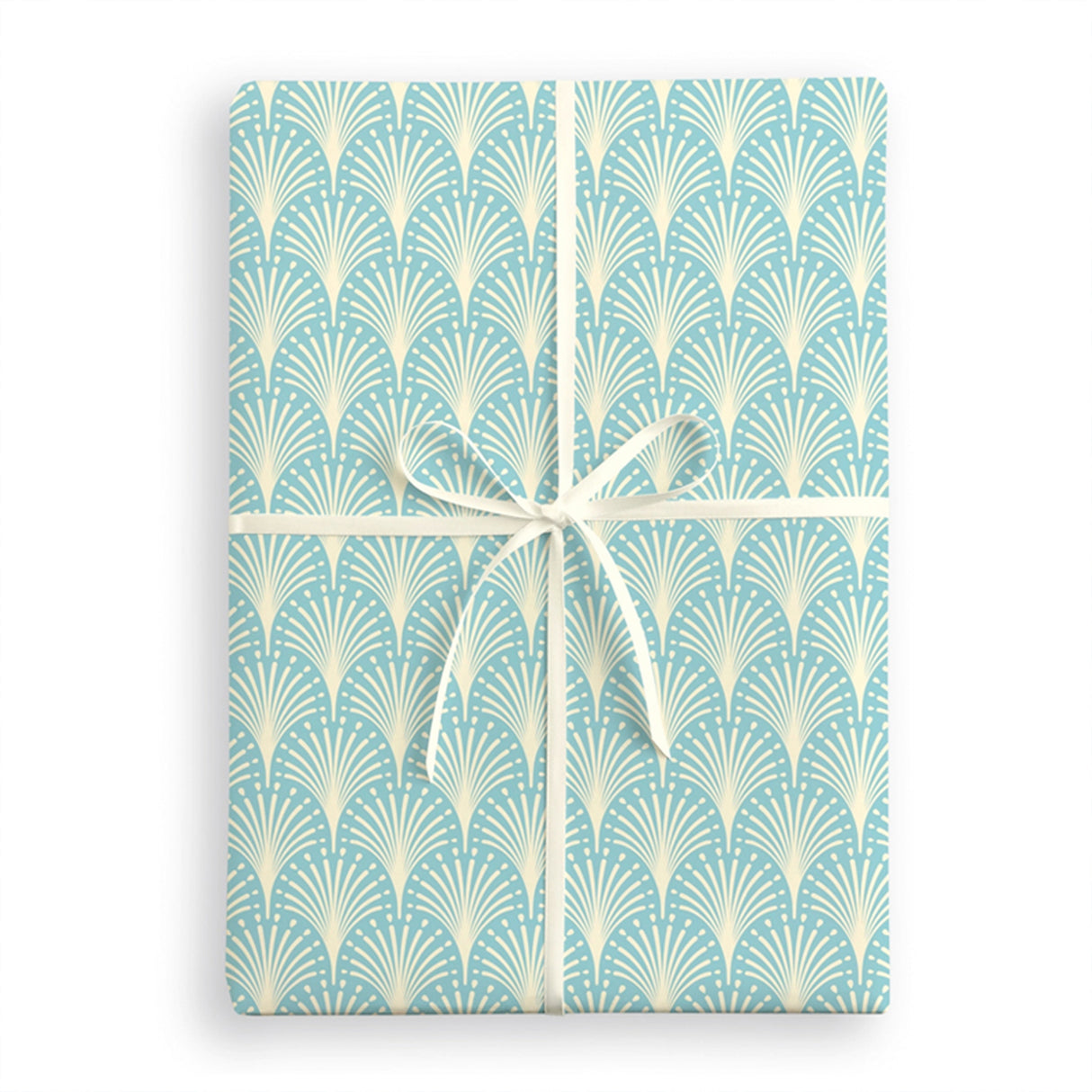 Gift wrap with a blue and white geometric pattern and a white ribbon on a white background