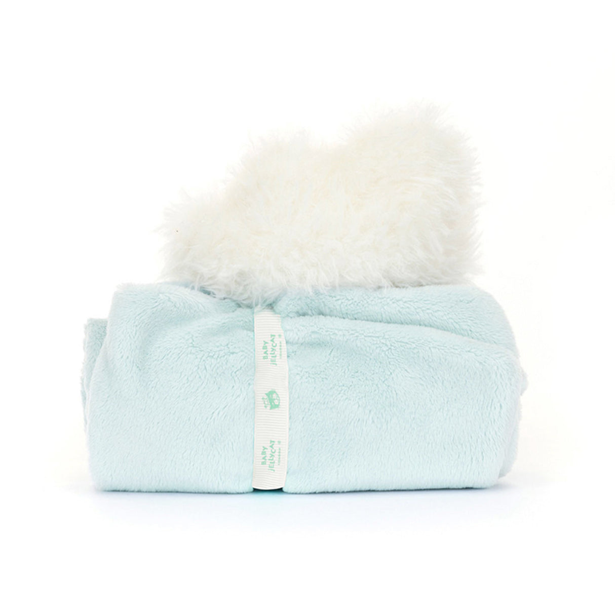 Light blue blanket with a white fluffy item on top on a white background