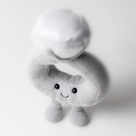 Jellycat Plush dimond ring shaped toy with a face on a white background