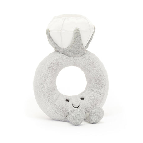 Jellycat Plush dimond ring shaped toy with a face on a white background