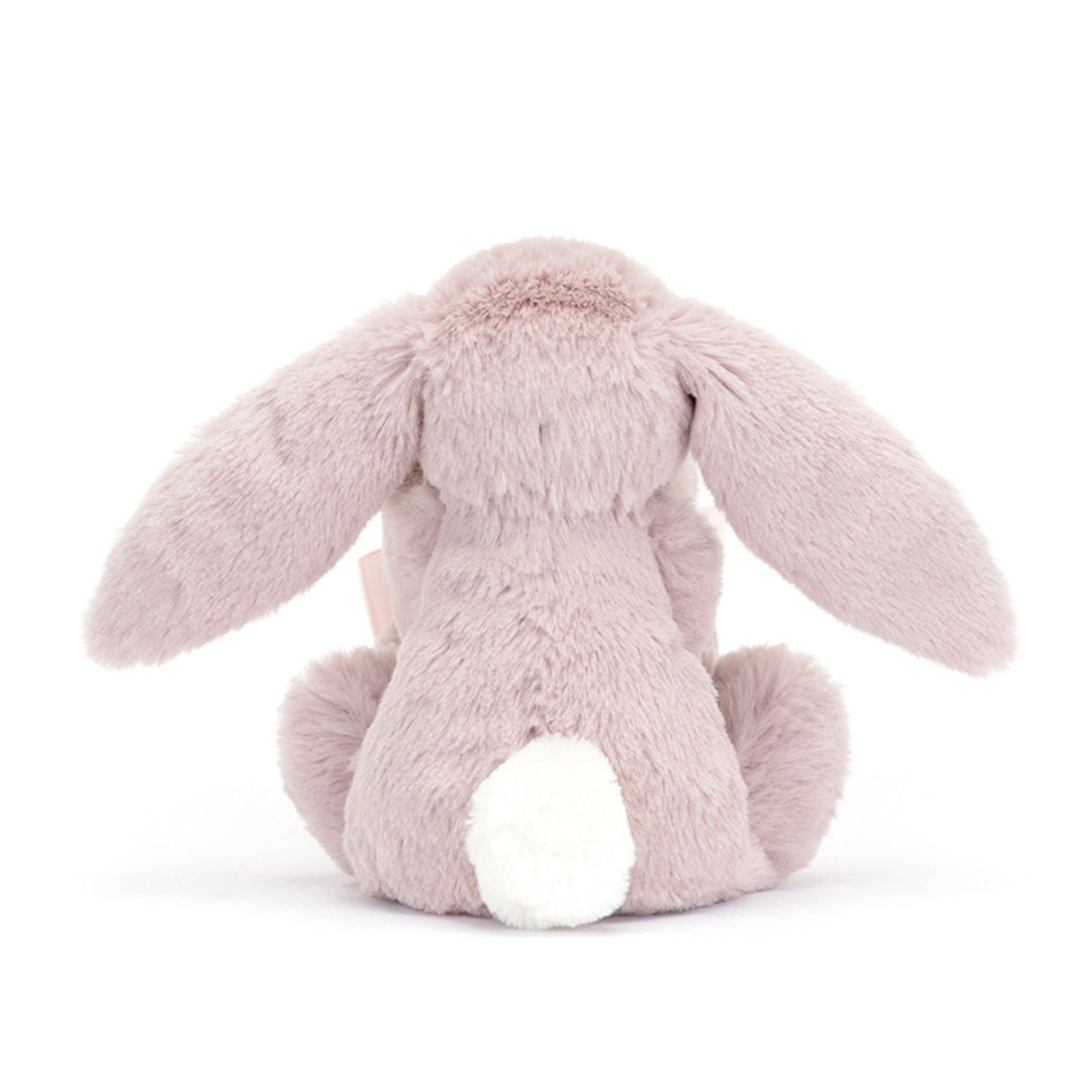 Pink plush bunny toy on a white background
