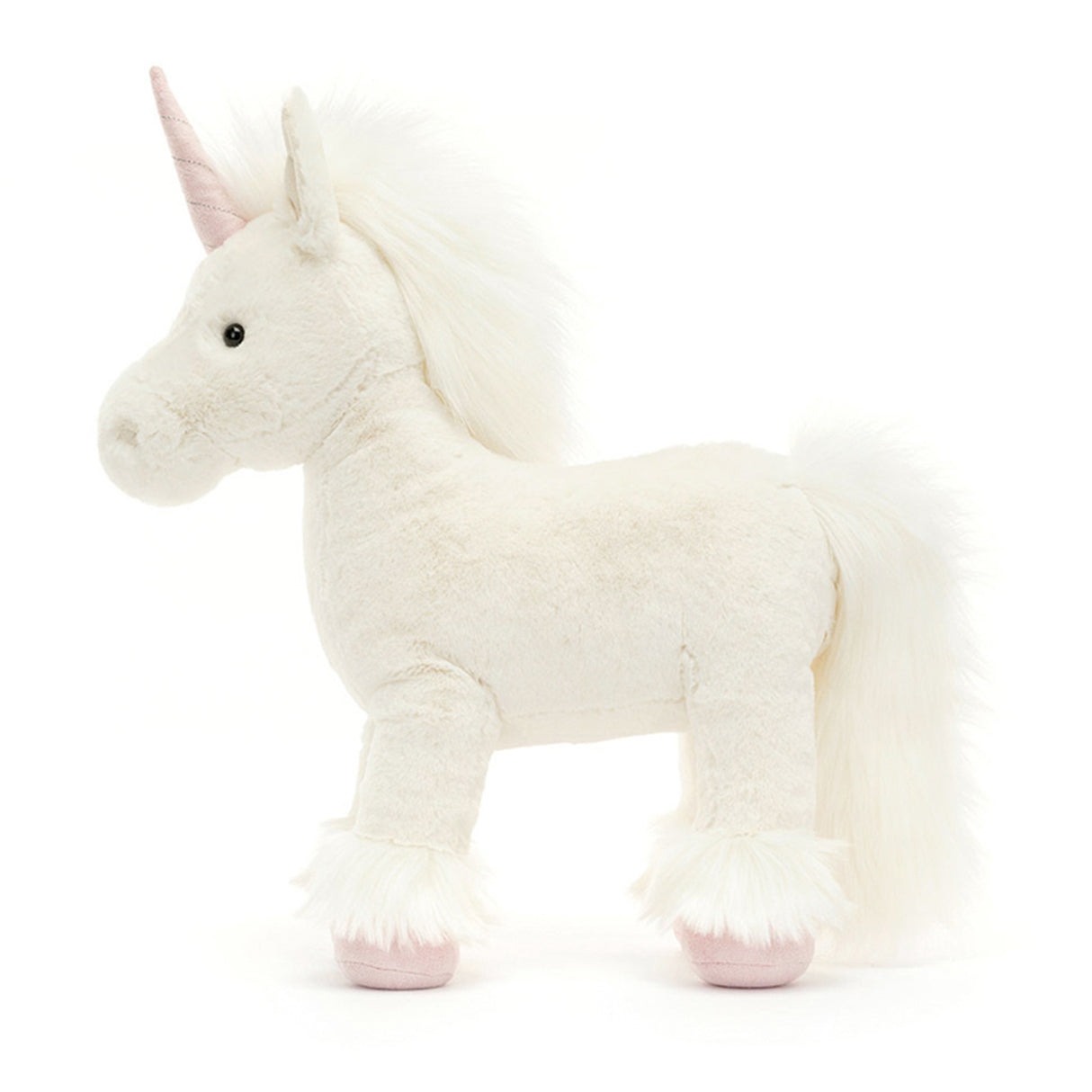 White plush unicorn toy on a white background