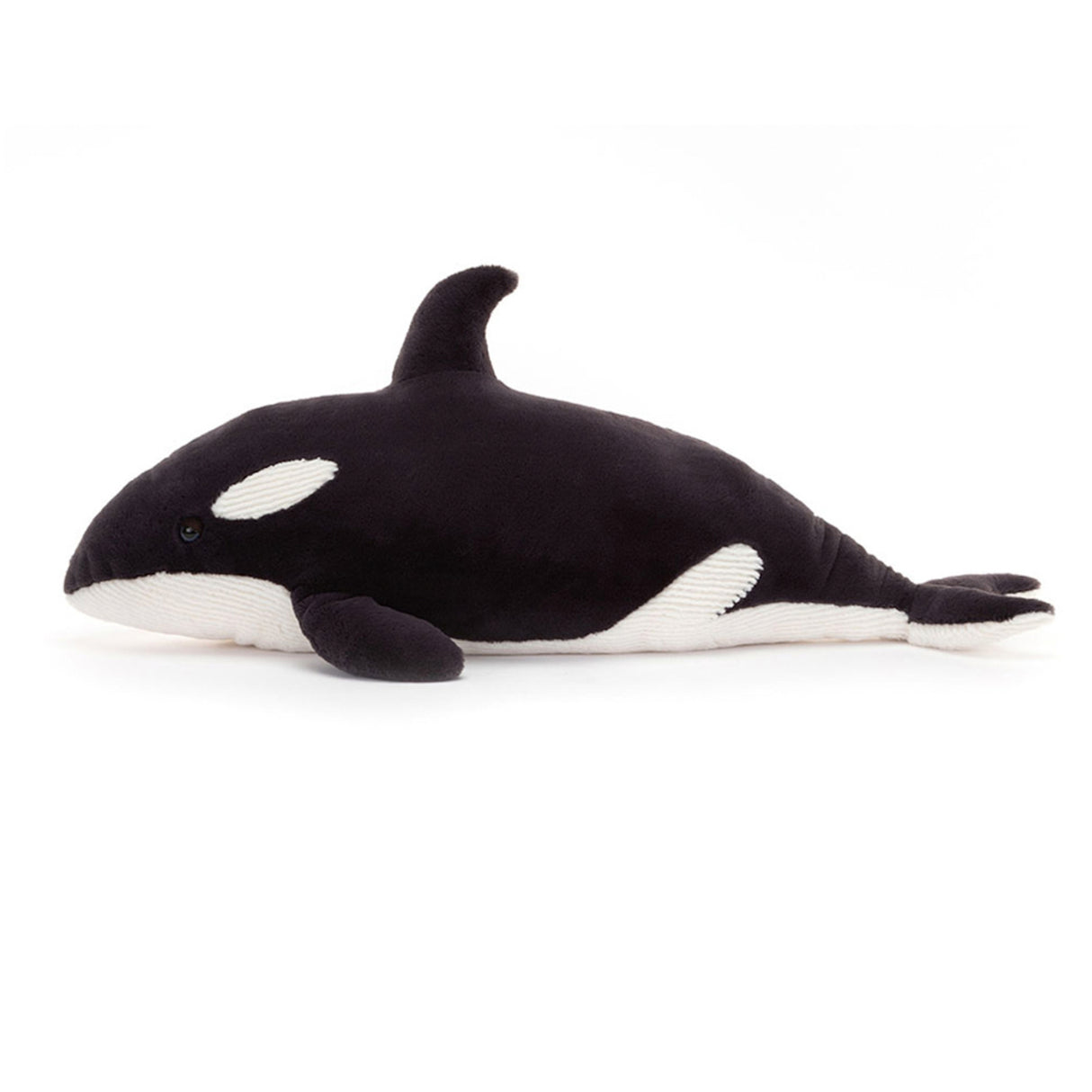 Plush toy orca whale on a white background