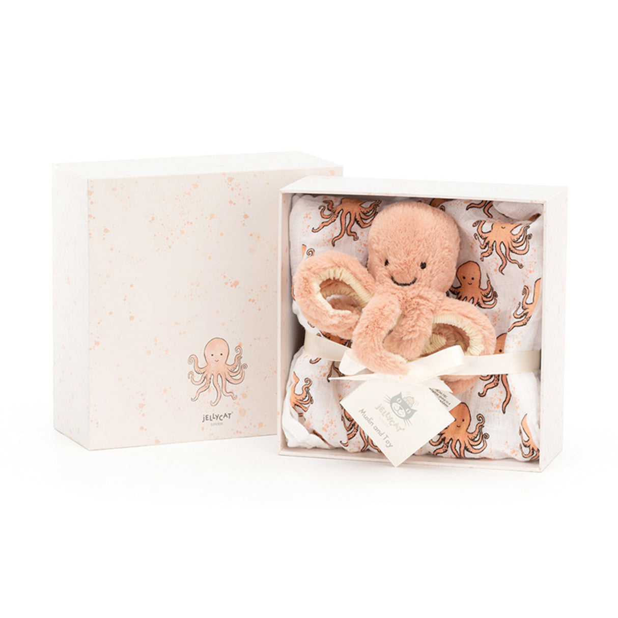 Coral coloured plush octopus toy in a gift box with a muslin swaddle with octopus print