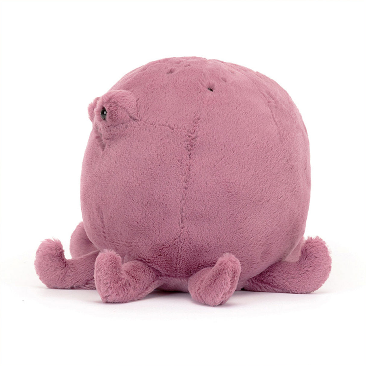 Pink plush octopus toy on a white background
