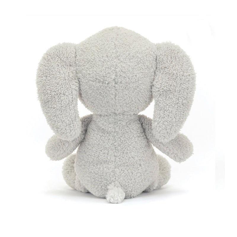 A gray plush toy resembling a baby elephant with short, floppy ears and a soft, chunky head from behind