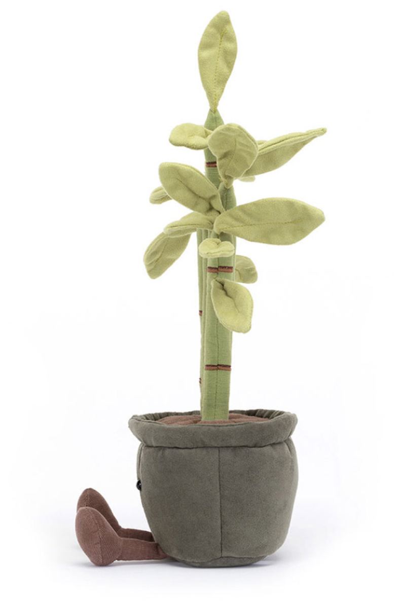 A plush toy resembling a potted bamboo plant with green leaves, red-brown stitch details, and a gray pot. The toy has fluffy soil at the bottom.