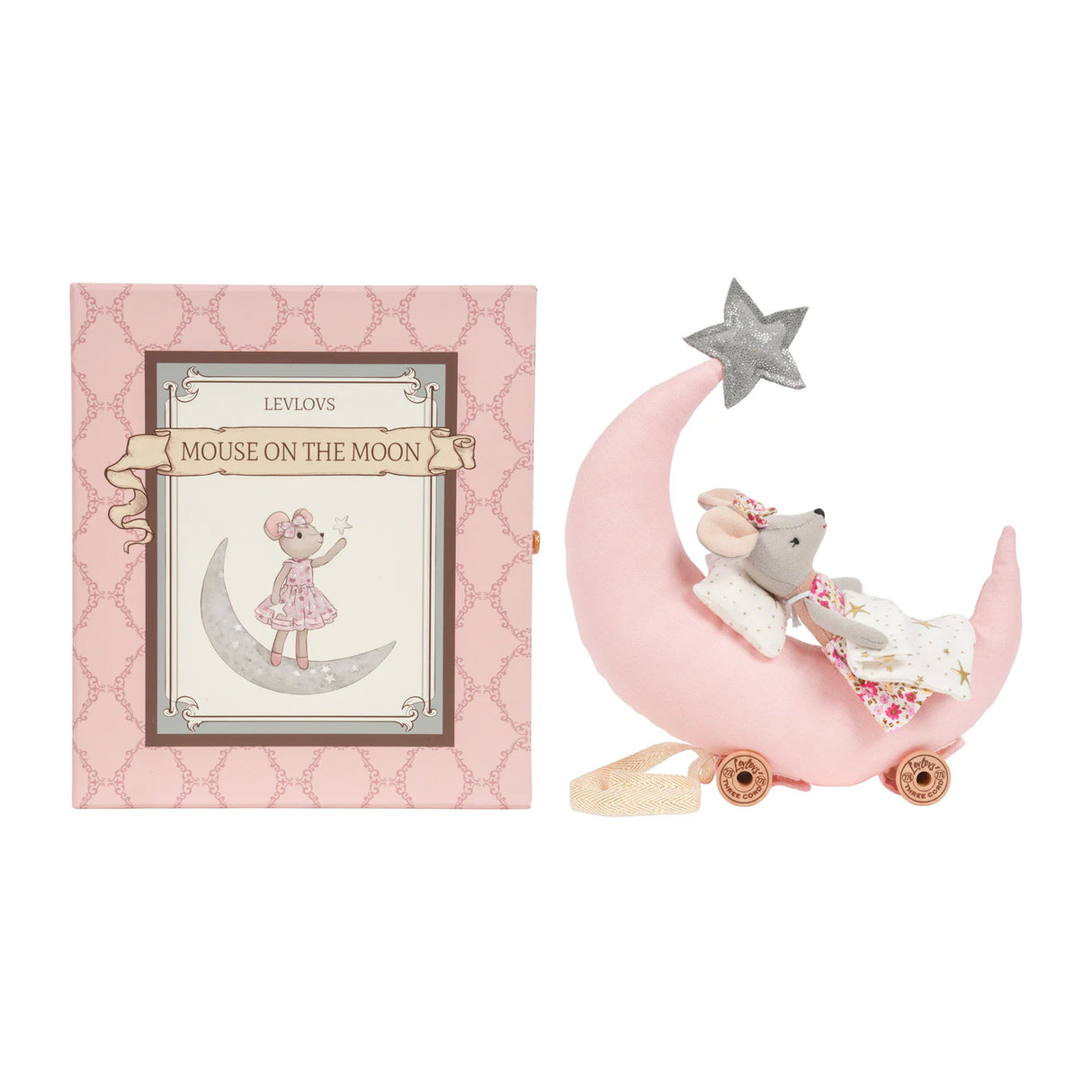 Plush toy mouse on a pink crescent moon with a star, next to a decorative box with 'Mouse on the Moon' illustration.