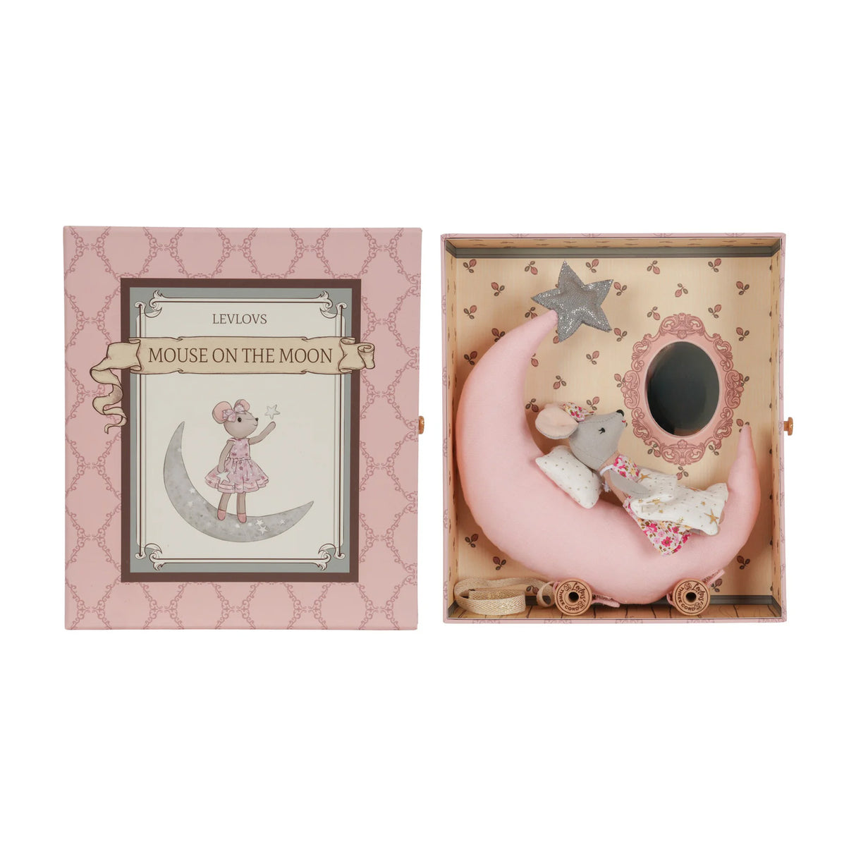 Decorative mouse on a pink moon with packaging on a white background