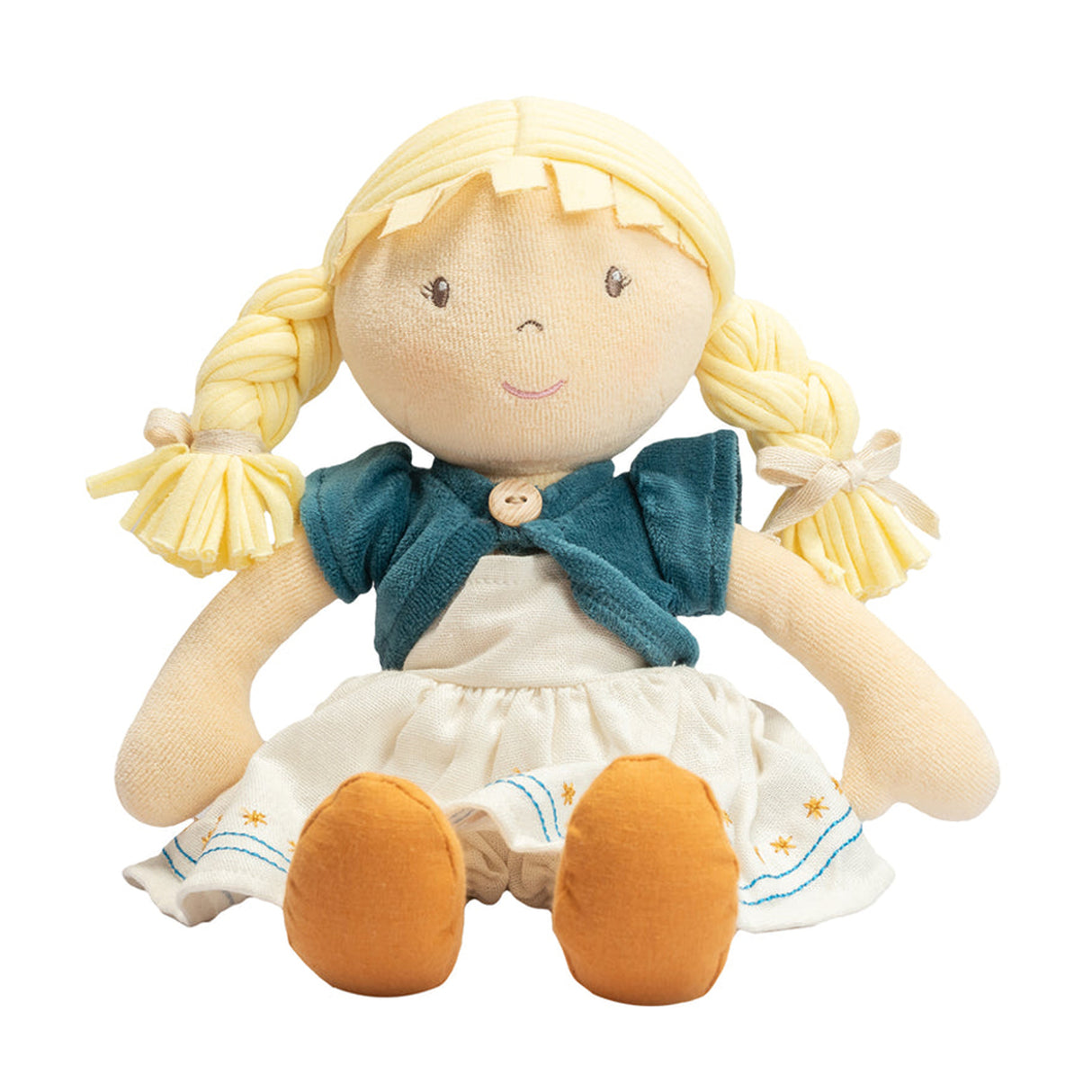 Soft rag doll with blonde hair, blue sweater, and white dress on a white background