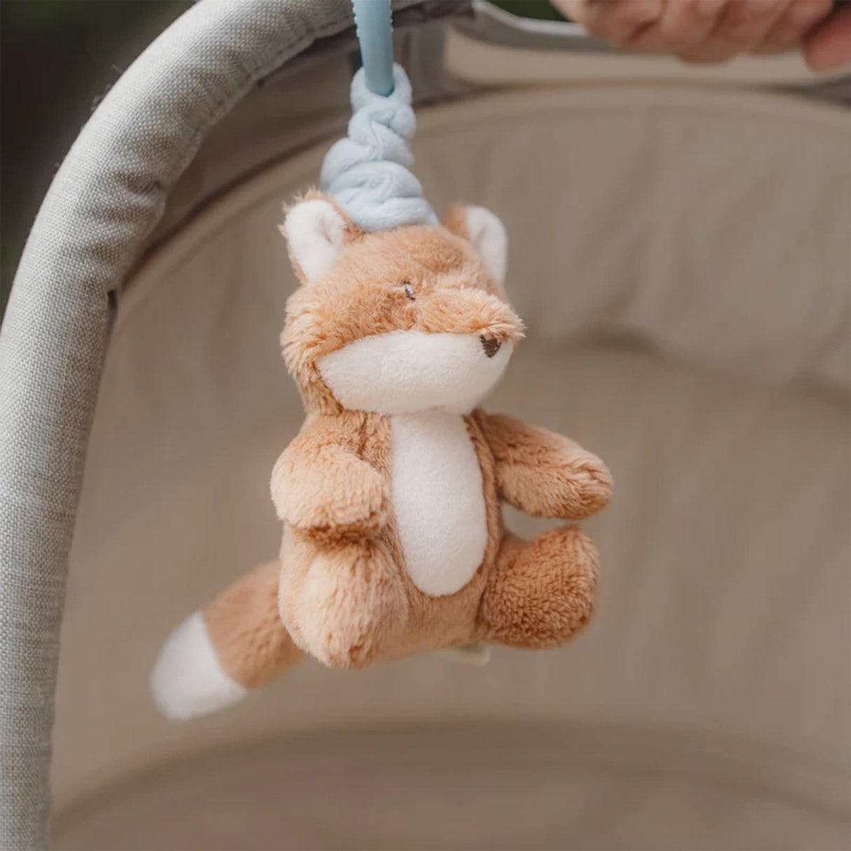 Little Dutch Pull and shake Plush fox toy hanging from a pram