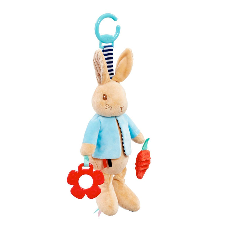 Plush Peter Rabbit baby toy with baby teether and carrot on a white background