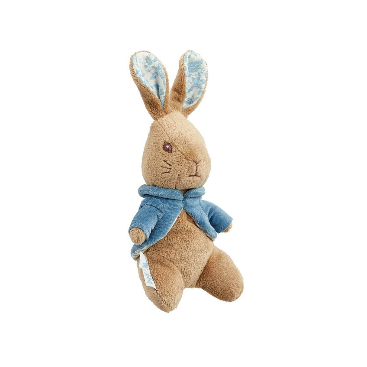 Stuffed small Peter rabbit toy with a blue jacket on a white background