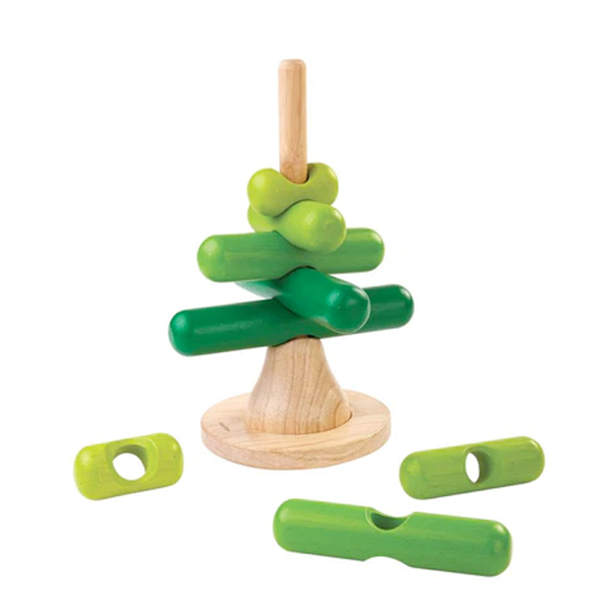 Green wooden Stacking tree toy with parts with a natural wood base on a white background