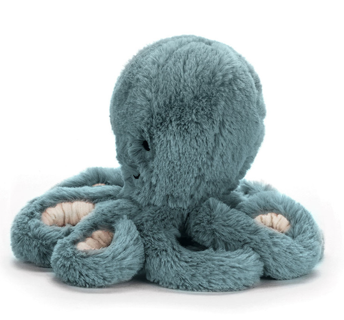 A soft toy resembling an octopus, in teal color with white and lighter teal tentacles, and a scruffled fur texture.
