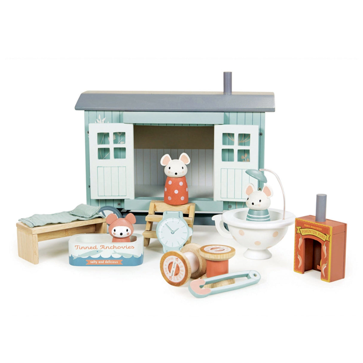 Wooden toy set with a small house and various animal figures on a white background