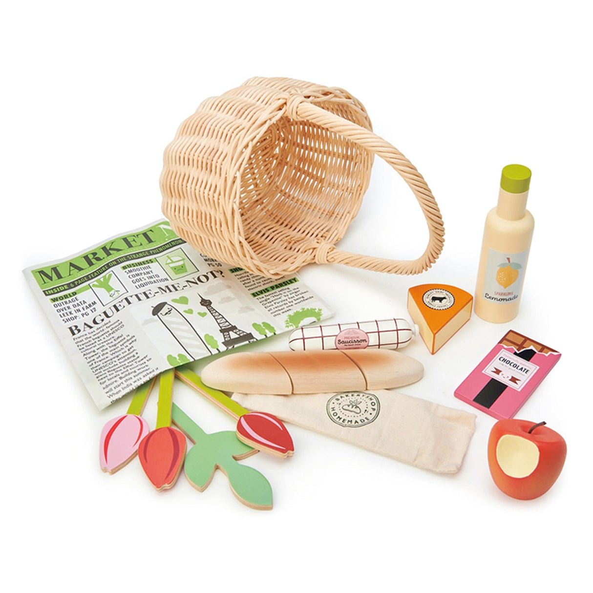 Toy picnic basket set with wicker basket, bread, cheese, and other food items on a white background