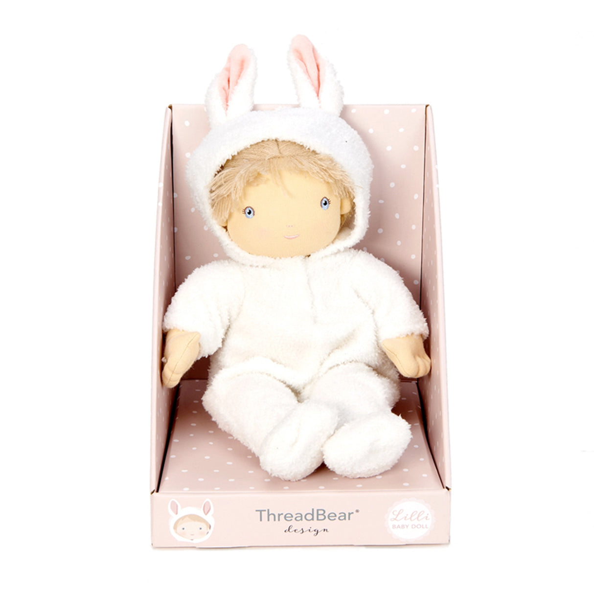 Plush toy baby doll in a white outfit with bunny ears in a pink polka dot box, brand 'ThreadBear' visible.