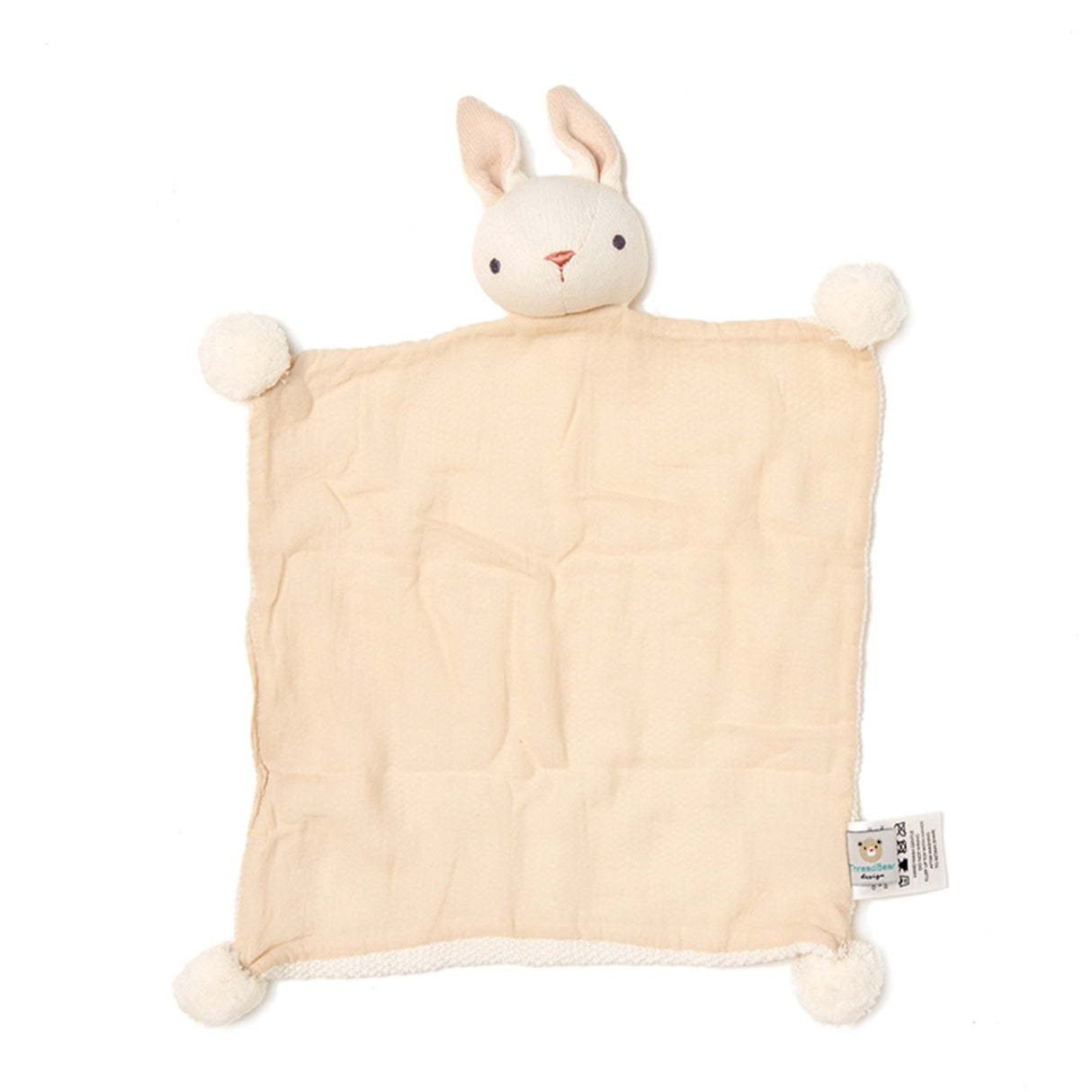 Beige plush blanket with bunny face and ears on a white background