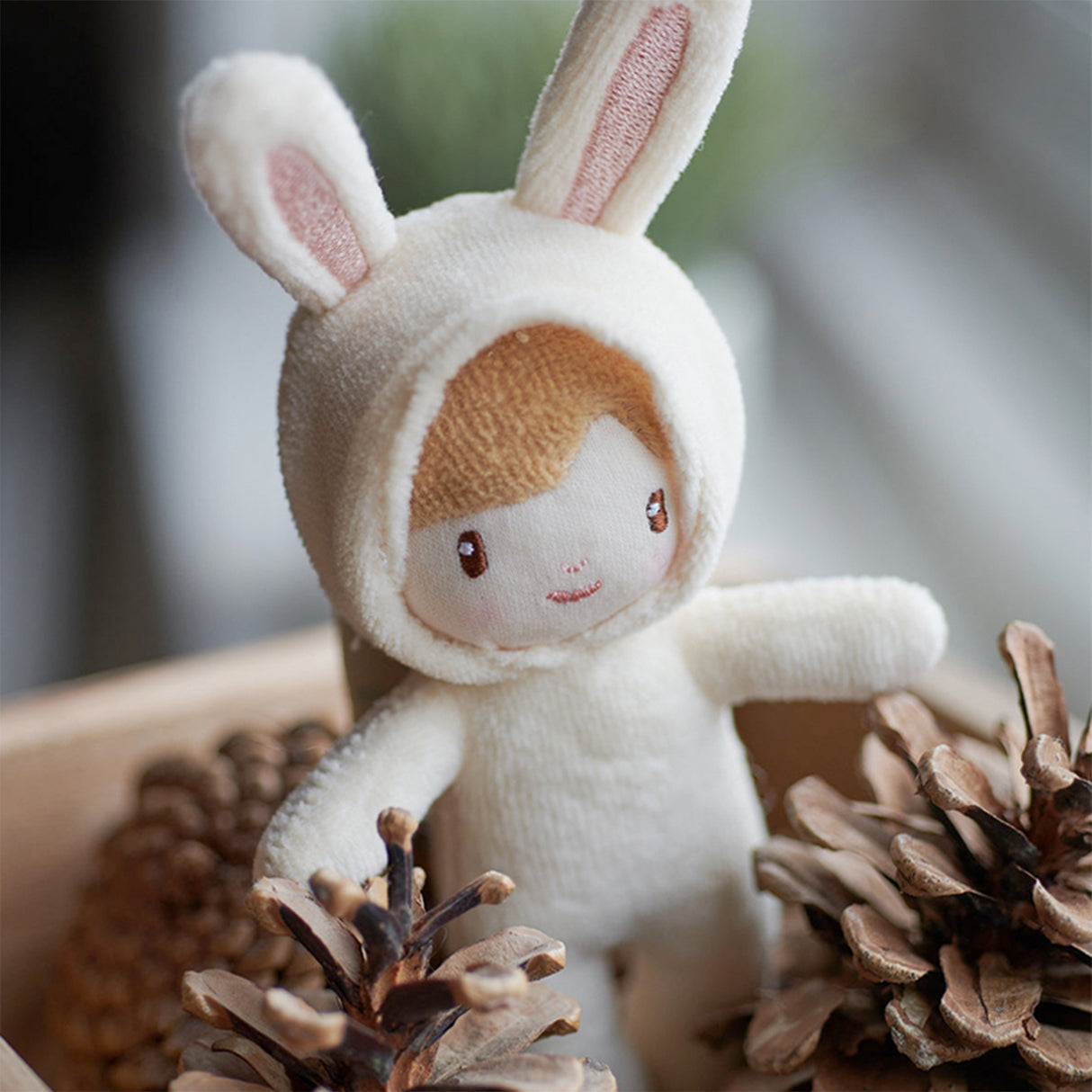 Bunny doll with pine cones
