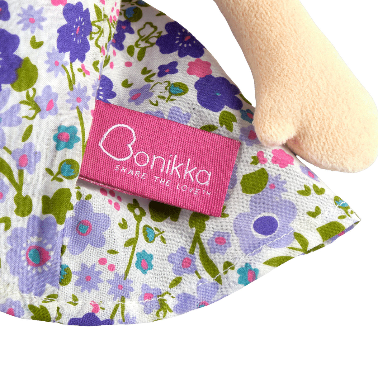 Floral-patterned fabric with a pink 'Bonikka' label on a white background
