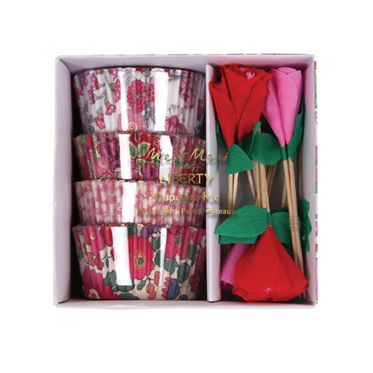 A set of floral design cases with pink and red flower toppers for cupcakes, presented in a box.
