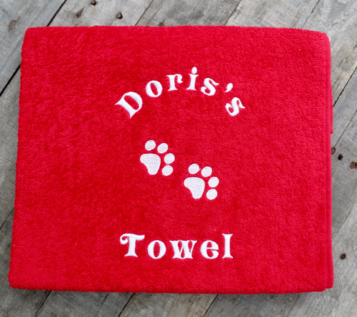 A large size cherry colour Personalised Dog Bath Towel with name and paw prints