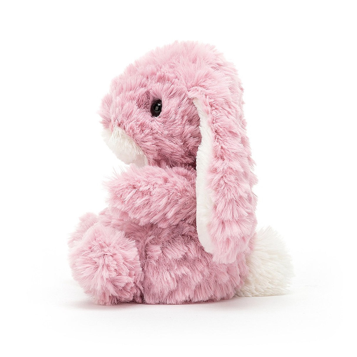 A plush toy resembling a pink bunny with a soft tummy, long ears, and a bobtail.