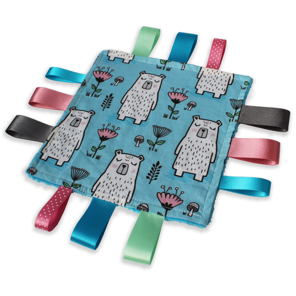 A lovely unique handmade Baby Taggy comforter which can be personalised.100% soft cotton, printed using an eco-friendly process