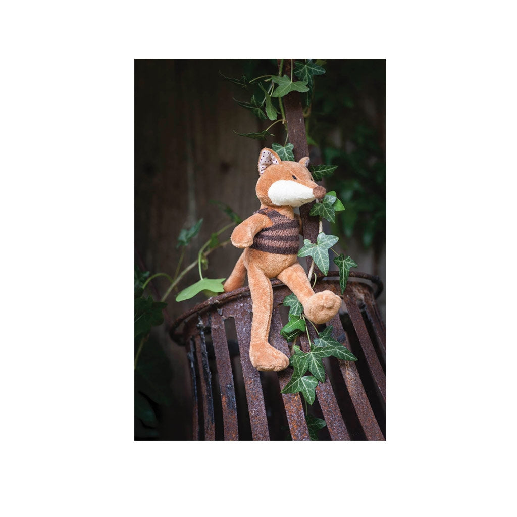 Ragtales Paxton fox baby toy wearing a handmade knitted stripy beige brown top and long bushy tail
