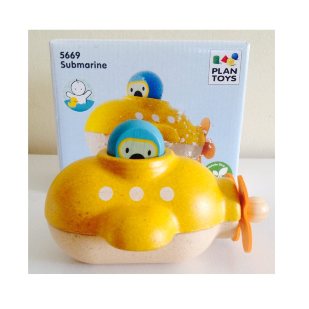 Plan Toy Yellow Submarine eco friendly with a spinnable propeller and a blue removable diver in front of product box