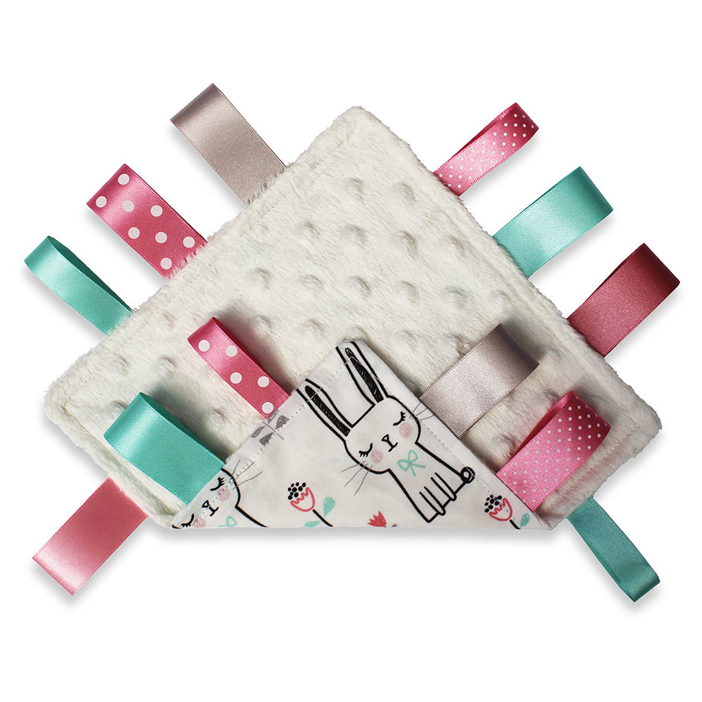 Both side views of a lovely unique handmade Baby Taggy comforter which can be personalised. 100% soft cotton, printed using an eco-friendly process