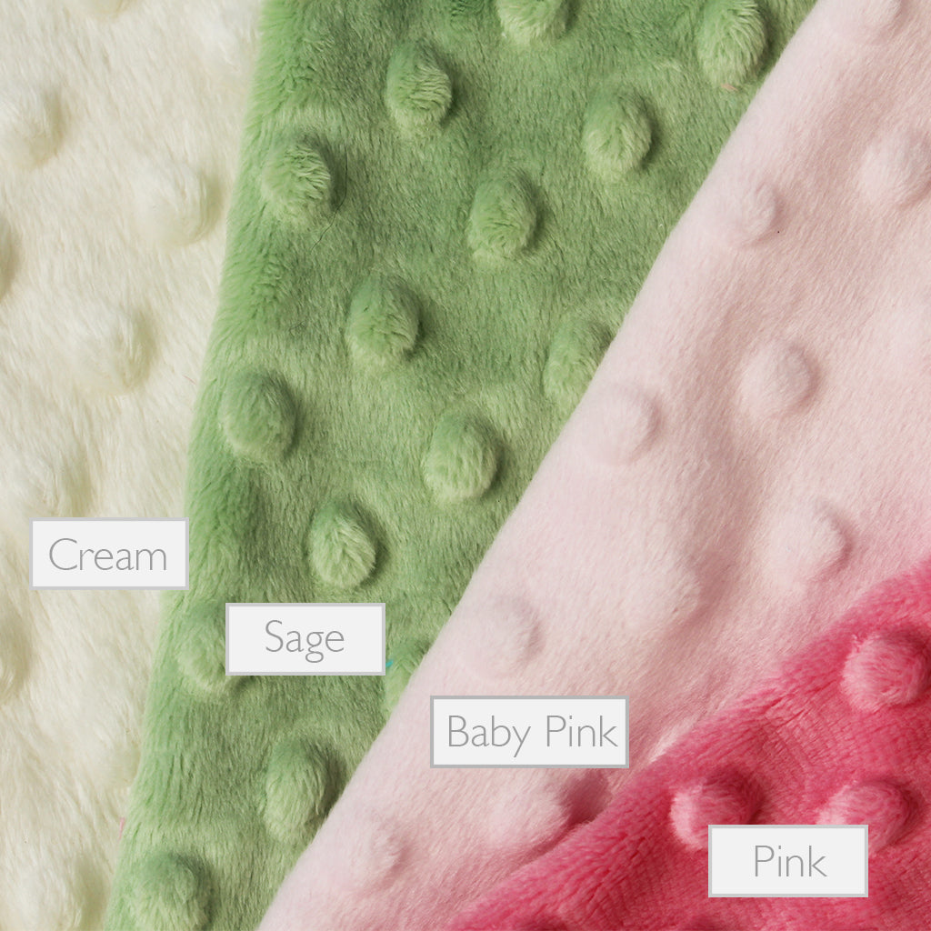 Selection of rear dimble for a lovely unique eco friendly handmade Baby Taggy comforter Professionally made using 'Wild Rose' fabric