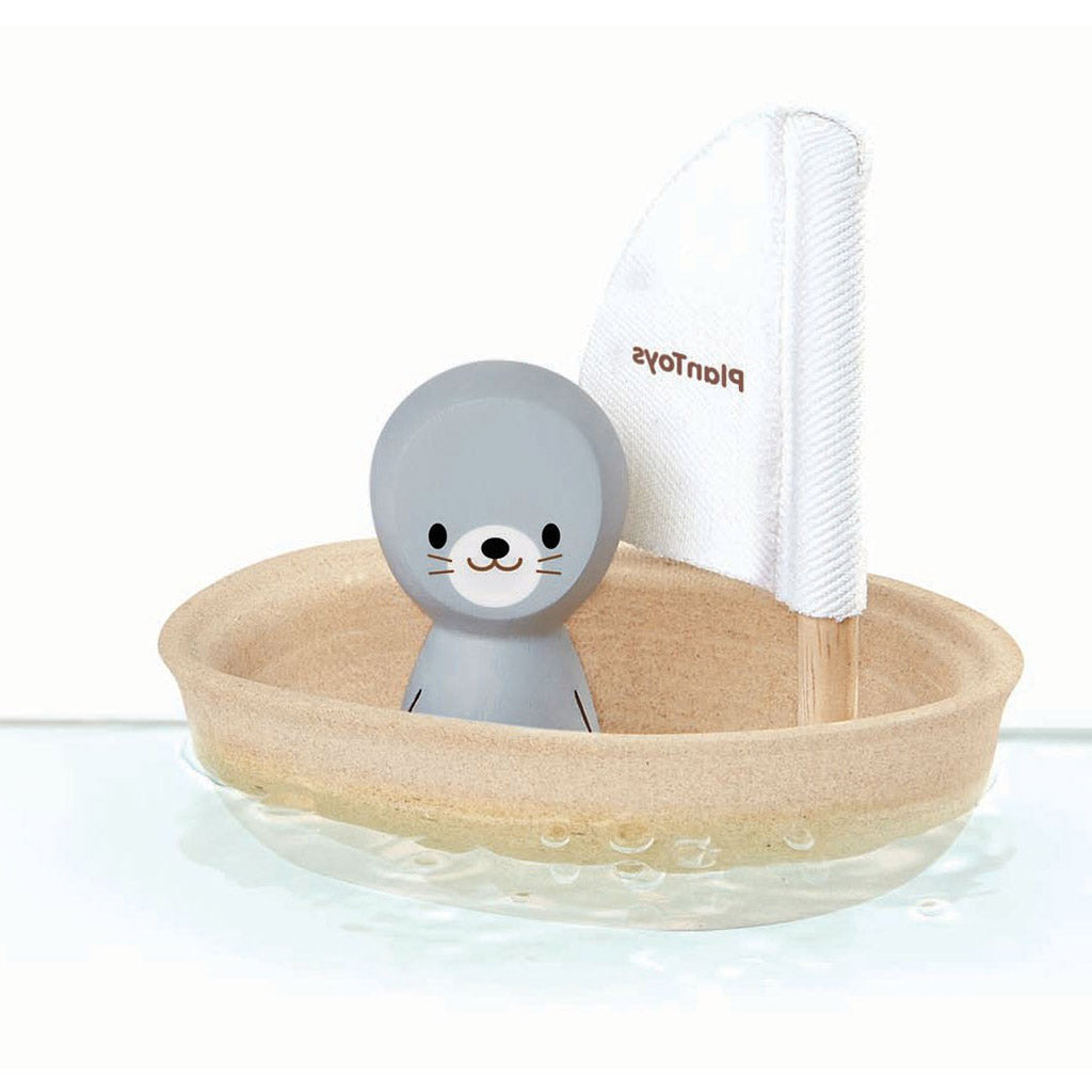 Eco Friendly Plan Toys woodend sailboat with friendly seal sailor