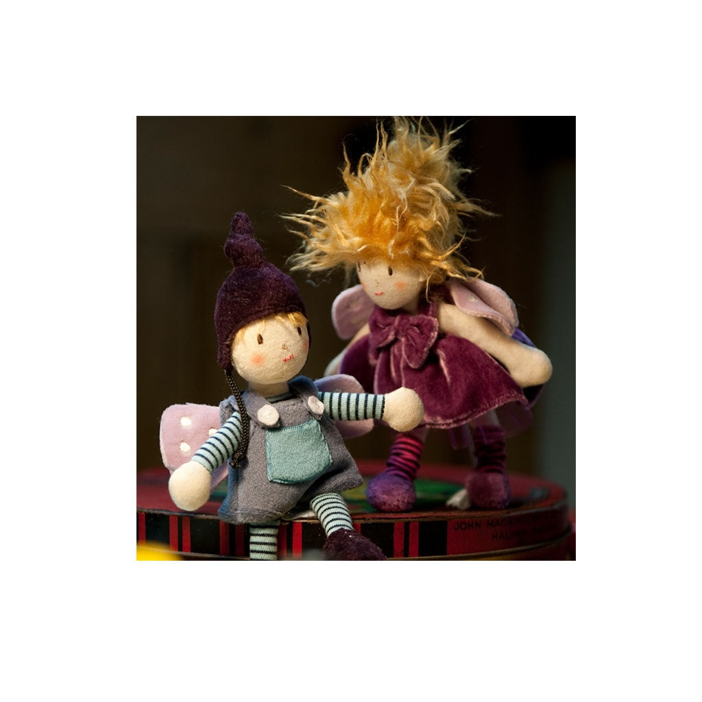 Playing with friend Impish Ragtales purple tooth fairy doll with backpack for lost milk tooth wearing purple socks