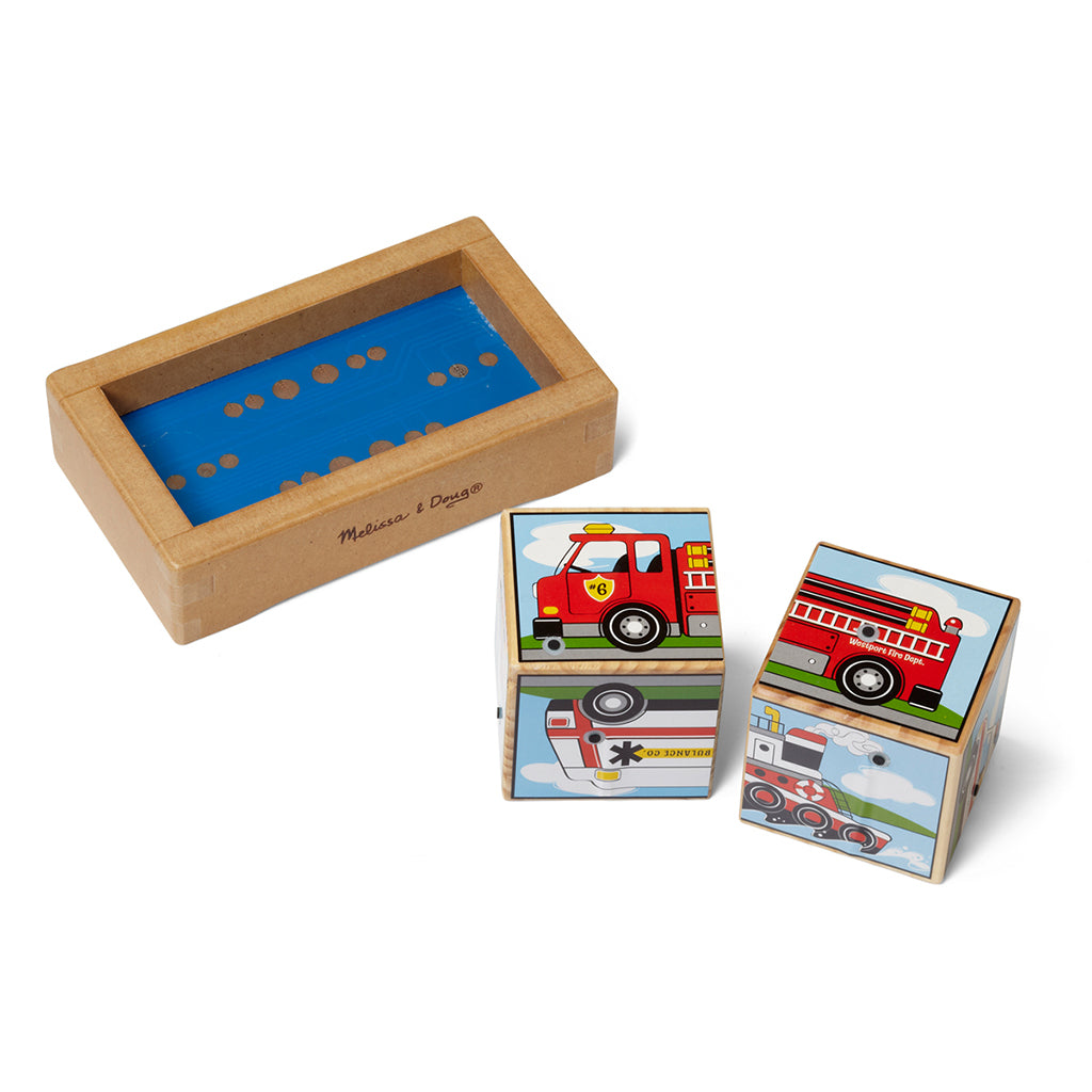 Two wooden Melissa & Doug Vehicle Sound Blocks picturing a fire engine, jet plane, locomotive, tugboat, ambulance and motorcycle
